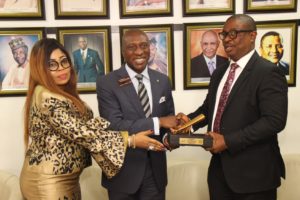 L – R shows Boma Ukwunna, Executive Director, SAHCO Plc;  Oscar N. Onyema, OON, Chief Executive Officer, The Nigerian Stock Exchange (NSE) and Olaniyi Adigun, Executive Director Sales & Marketing Skyway Aviation Handling Company Plc during presentation of the replica of the closing gong to both ED’s at the Facts Behind the Offer presentation to capital market stakeholders at the Exchange today in Lagos.