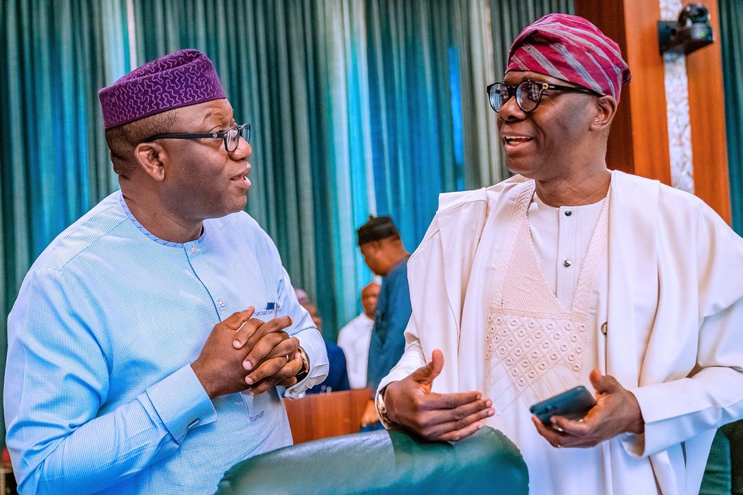 Lagos State Governor, Mr. Babajide Sanwo-Olu (right), in a discussion with his Ekiti counterpart, Dr. Kayode Fayemi during the National Economic Council meeting at the Council Chamber, Aso Villa, Abuja on Thursday, March 19, 2020.