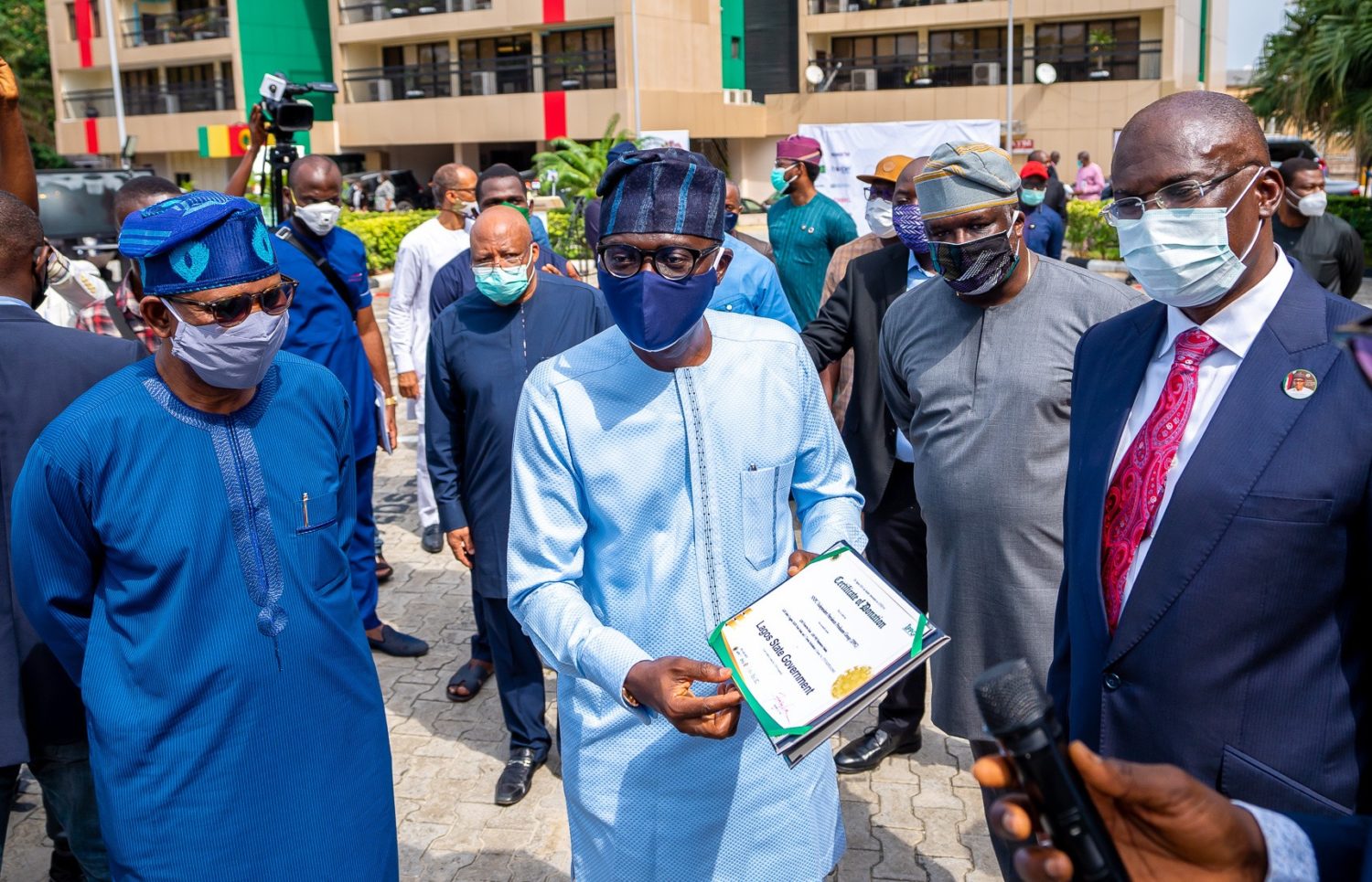 L-R: Minister of State for Health, Dr. Olorunimbe Mamora; Lagos State Governor, Mr. Babajide Sanwo-Olu; Chairman, Independent Petroleum Producers Group (IPPG), Mr. Ademola Adeyemi-Bero and Minister of State for Petroleum Resources, Mr. Timipre Sylva, during NNPC/IPPG donation of Six Ambulances; Sanitizers; Face masks and other safety equipment to the South West States as part of efforts to contain the COVID-19 pandemic, at NAPIMS Office, Ikoyi, Lagos, on Thursday, April 23, 2020.