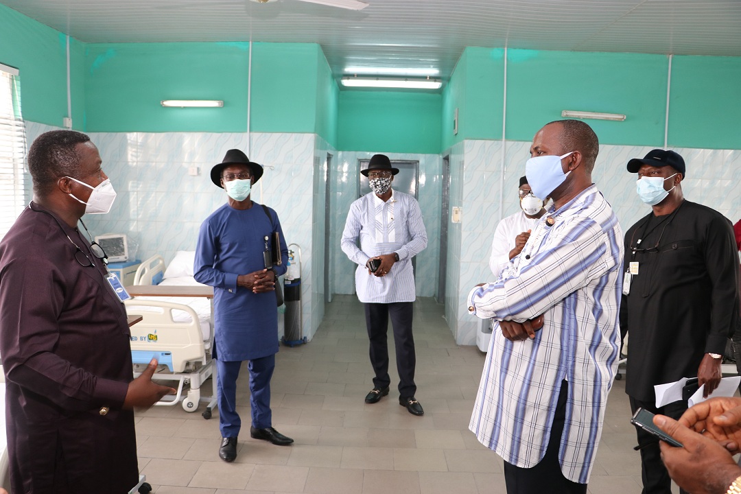 L-R Professor Princewill Chike, Rivers State Commissioner for Health; Dr. Okuns Ohiosimuan, NLNG Chief Medical Officer; Engr. Adeleye Falade, NLNG GM Production & medical personnel during the inspection of the Bonny Zonal Hospital Holding Centre…recently