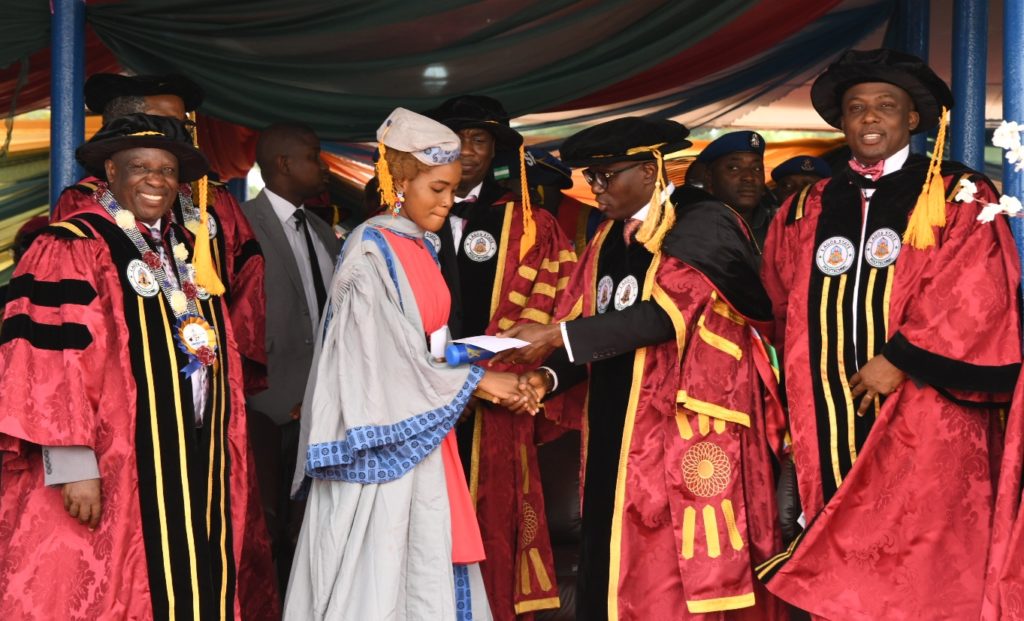 L-R: Rector, Lagos State Polytechnic, Mr. Samuel Sogunro; Lagos State Deputy Governor, Dr. Obafemi Hamzat; Overall Best Graduating Student, Miss Nkechi Alexandra Kingsley and Governor Babajide Sanwo-Olu during the 27th Convocation and Award Ceremony of Lagos State Polytechnic at the Convocation Ground, Ikorodu Campus, Lagos, on Thursday, March 12, 2020.