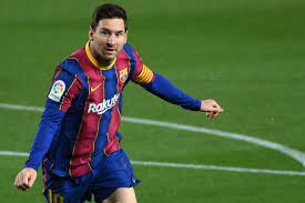 Messi extends Barcelona contract by five years, accepts wage cut