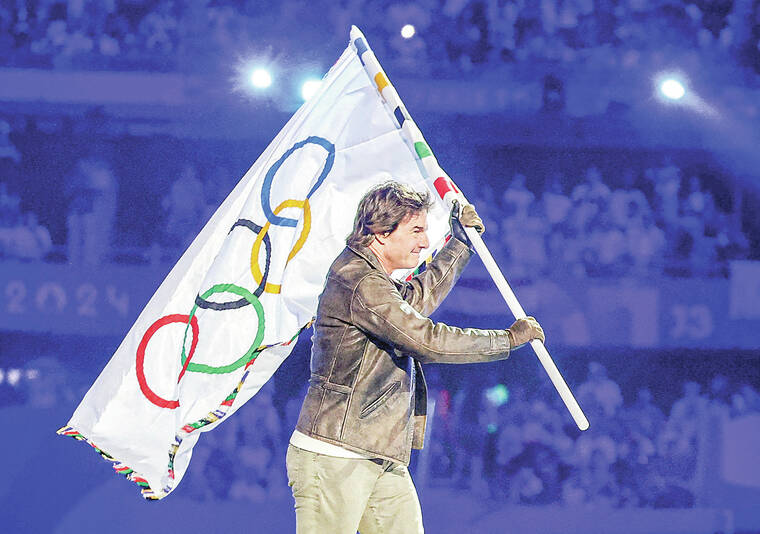 Tom Cruise hands Olympic flag to LA, closing Paris Games